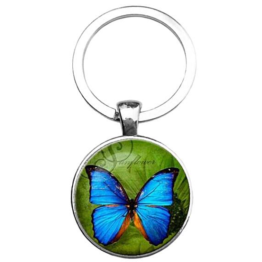 Přívěšek na klíče na kabelku kovový Modrý motýl